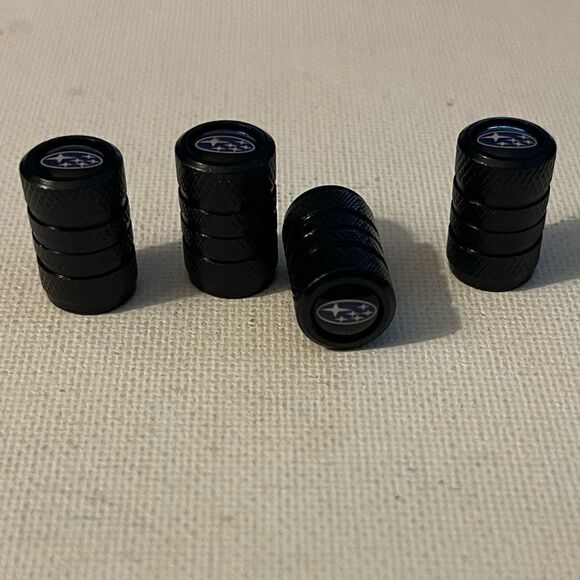 Subaru logo valve Stem caps in black set of 4 NWT - Picture 2 of 4
